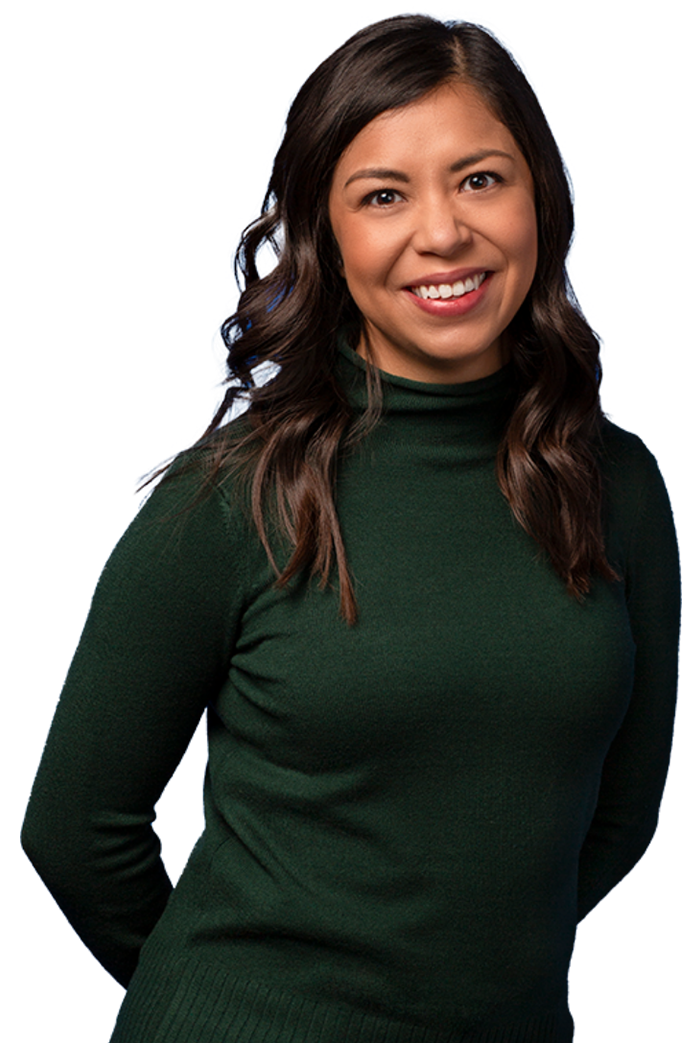 A female employee smiling and looking at the camera